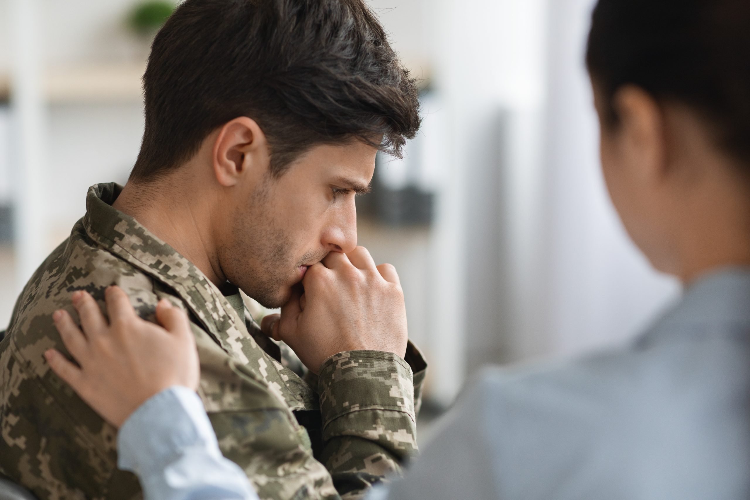 active military member or veteran recovering in a rehab center, military member in therapy at drug rehab center