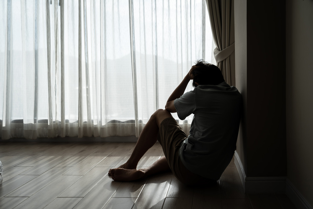 man struggling with depression and mental health needing therapy in young adults